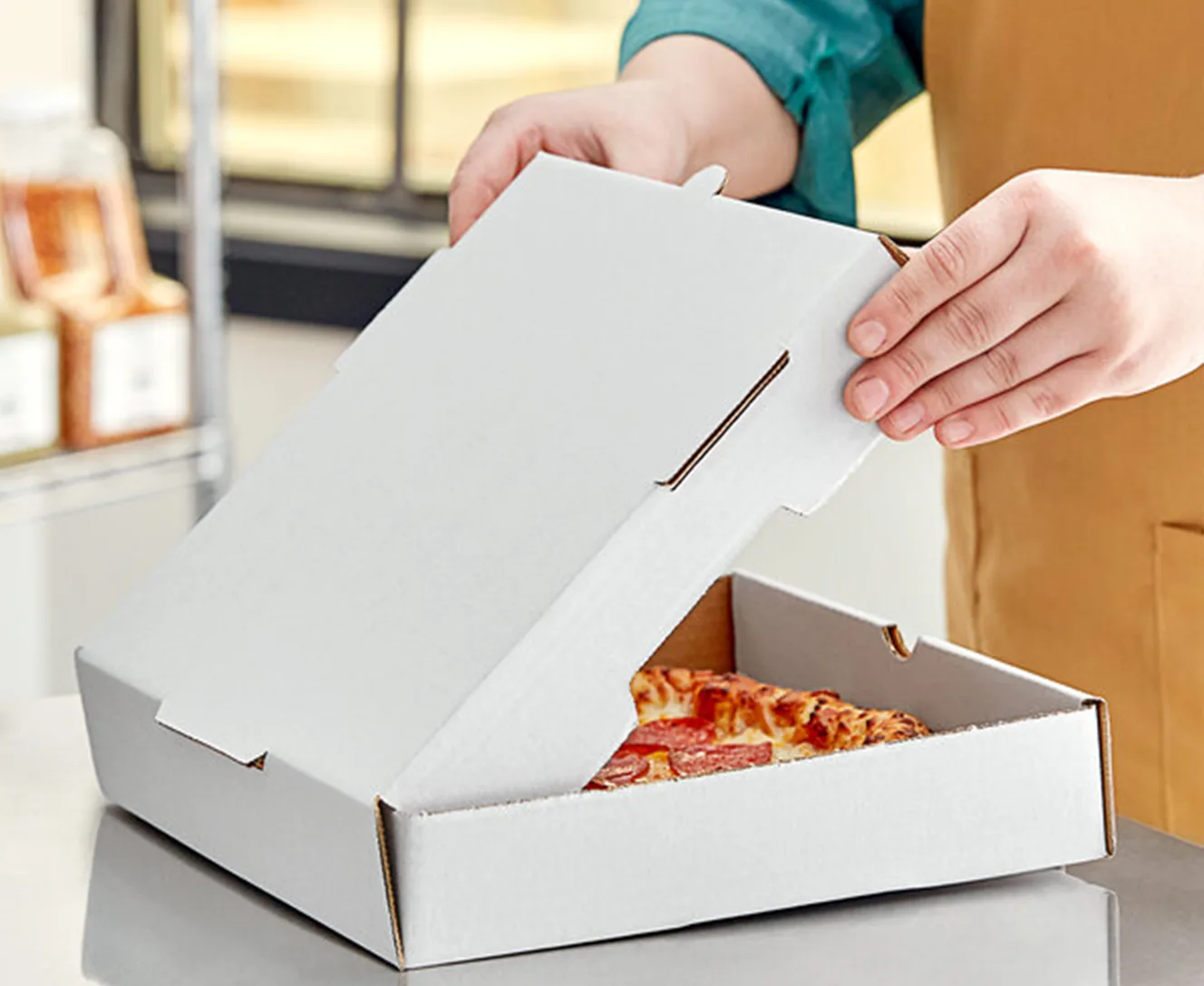 Materiał niestandardowego pudełka na pizzę.